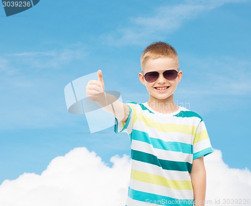 Image of smiling cute little boy in sunglasses