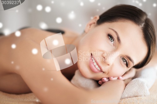 Image of beautiful young woman in spa