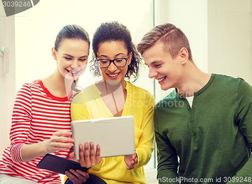 Image of smiling students with tablet pc computer