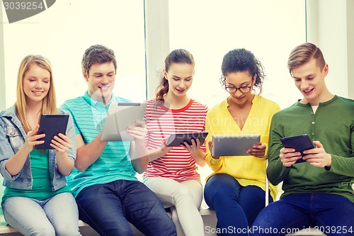 Image of smiling students with tablet pc computer