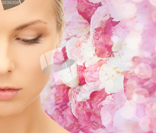 Image of beautiful young woman half face