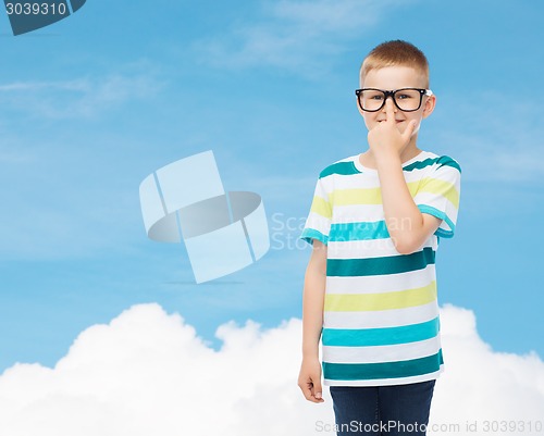 Image of smiling little boy in eyeglasses