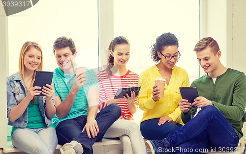 Image of smiling students with tablet pc computer