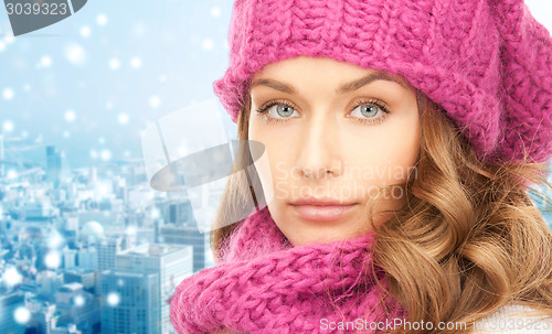 Image of close up of young woman in winter clothes