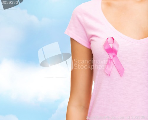 Image of close up of woman with cancer awareness ribbon