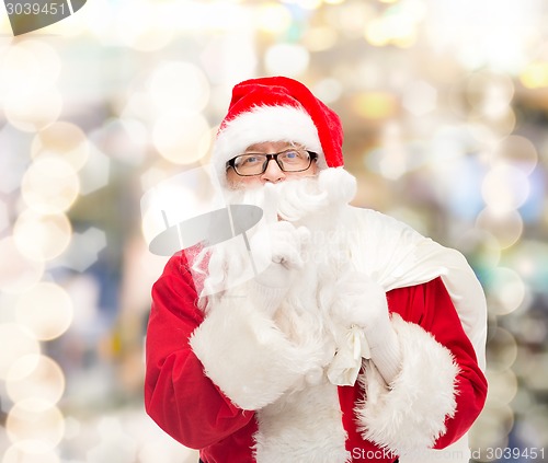 Image of man in costume of santa claus with bag