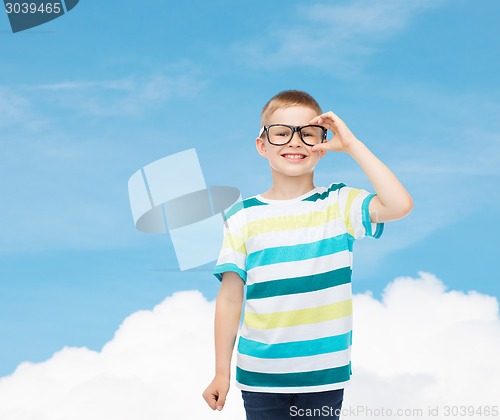 Image of smiling little boy in eyeglasses