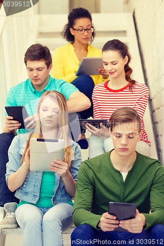 Image of busy students with tablet pc computer