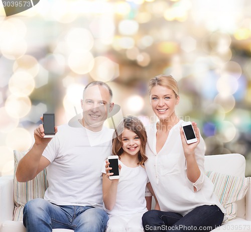 Image of happy family with smartphones