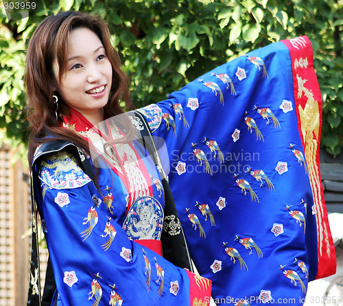 Image of Asian woman in traditional dress.