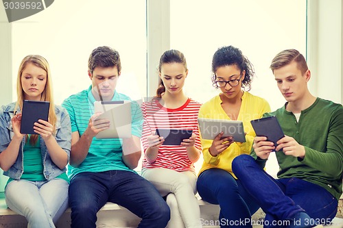 Image of smiling students with tablet pc computer