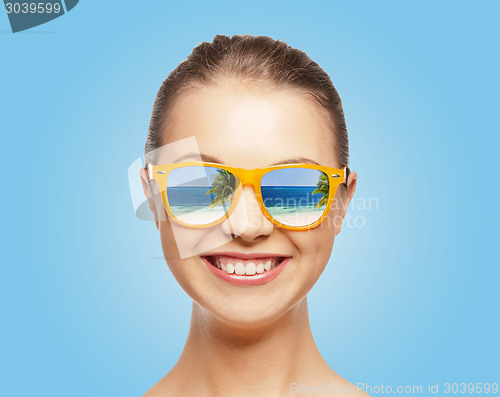 Image of happy teenage girl in sunglasses