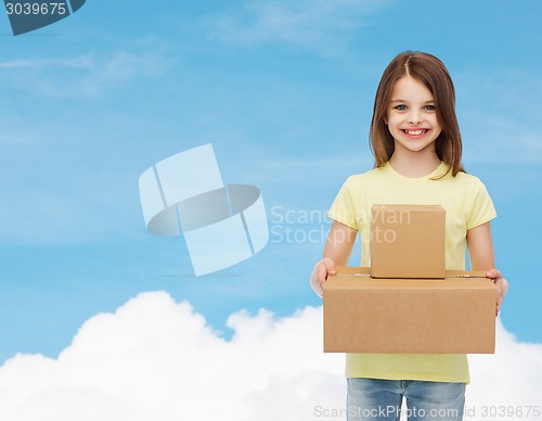 Image of smiling little girl in white blank t-shirt