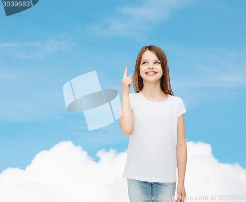 Image of smiling little girl in white blank t-shirt