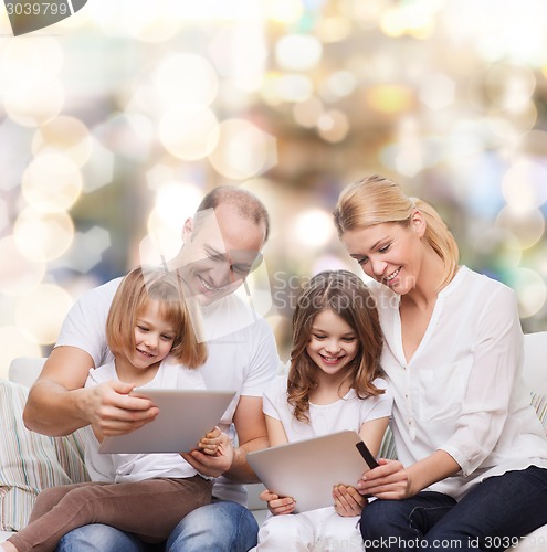 Image of happy family with tablet pc computers