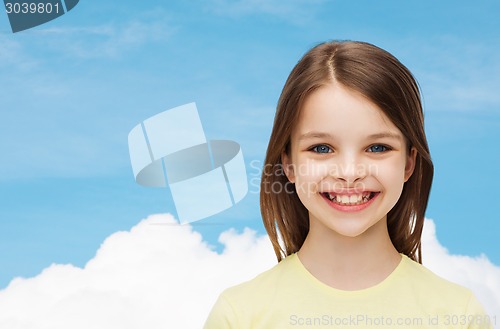 Image of smiling little girl over white background