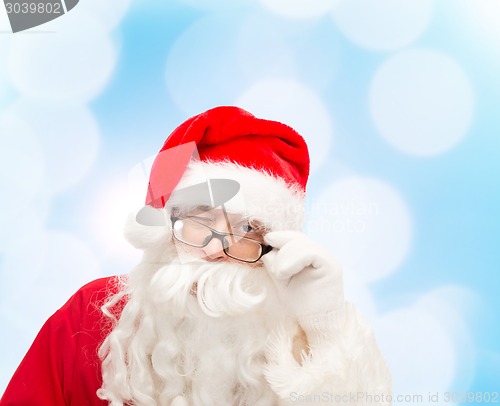 Image of close up of santa claus winking