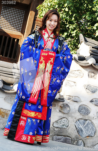 Image of Asian woman in traditional South Korean robes.