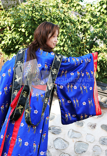 Image of Asian woman in traditional South Korean robes.