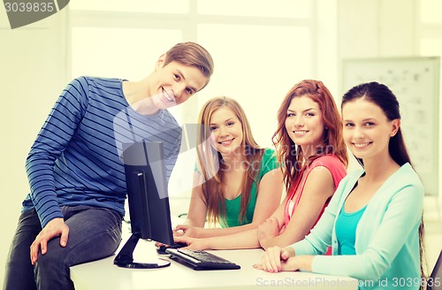 Image of group of smiling students having discussion