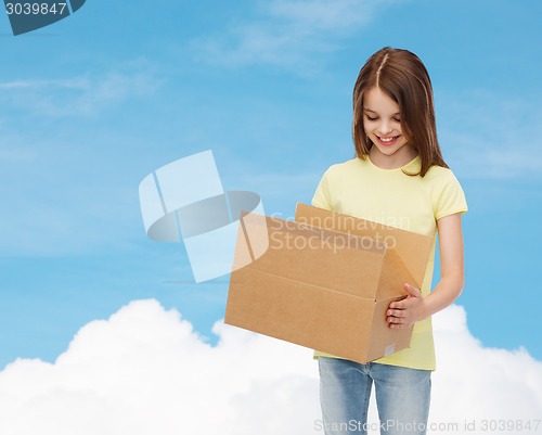 Image of smiling little girl in white blank t-shirt