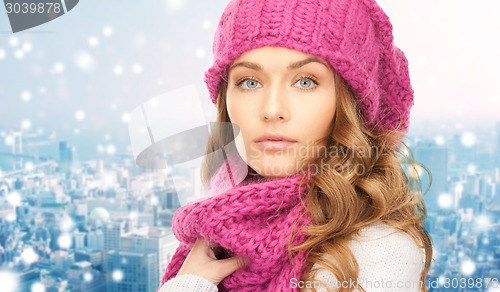 Image of close up of young woman in winter clothes