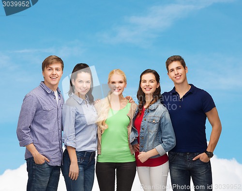 Image of group of standing smiling students