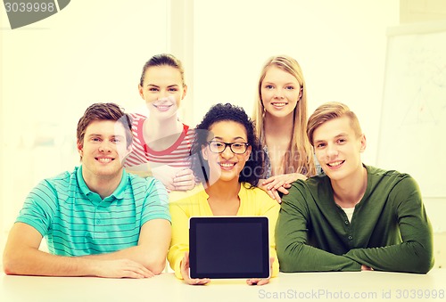 Image of smiling students showing tablet pc blank screen