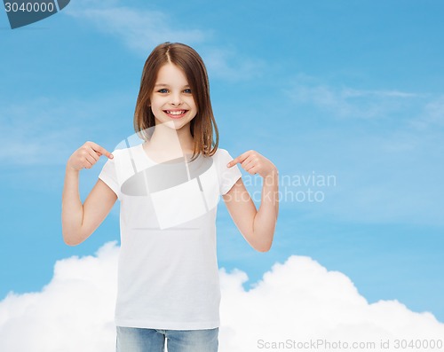 Image of smiling little girl in white blank t-shirt