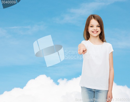 Image of smiling little girl in white blank t-shirt