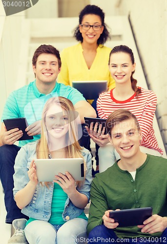 Image of smiling students with tablet pc computer