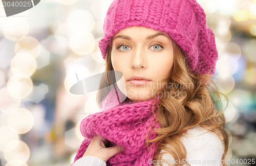 Image of close up of young woman in winter clothes