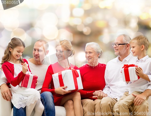 Image of smiling family with gifts