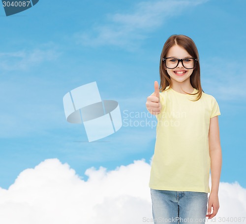 Image of smiling cute little girl in black eyeglasses