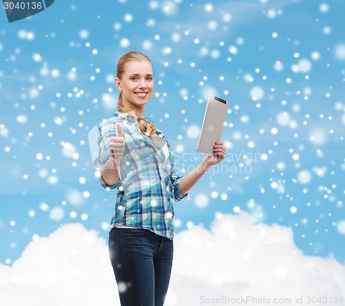 Image of smiling girl with tablet pc computer