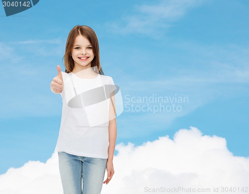 Image of smiling little girl in white blank t-shirt