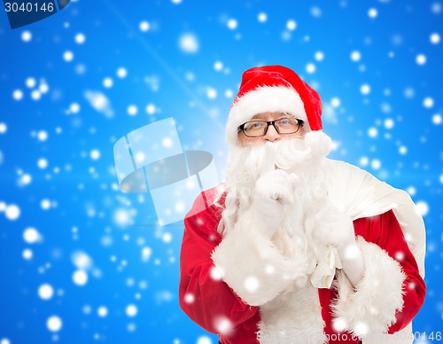 Image of man in costume of santa claus with bag