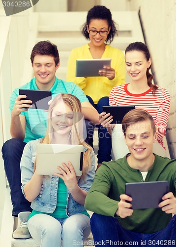 Image of smiling students with tablet pc computer