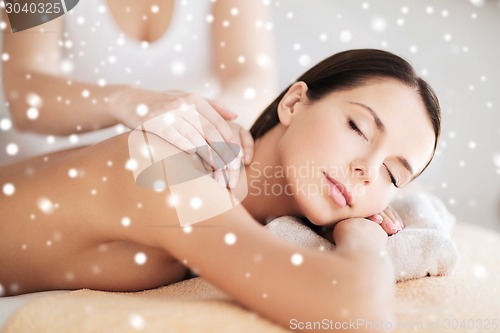 Image of beautiful young woman in spa
