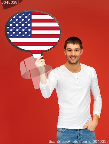 Image of smiling man with text bubble of american flag