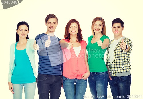 Image of group of smiling students showing thumbs up
