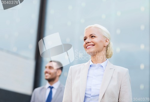 Image of close up of smiling businessmen