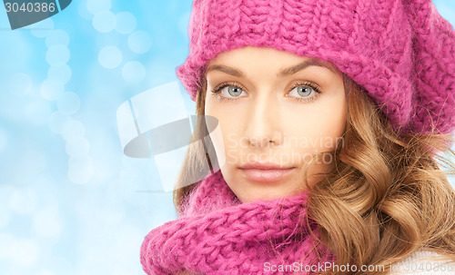 Image of close up of young woman in winter clothes