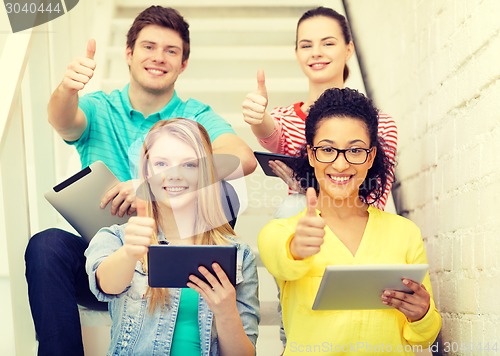 Image of smiling students with tablet pc computer