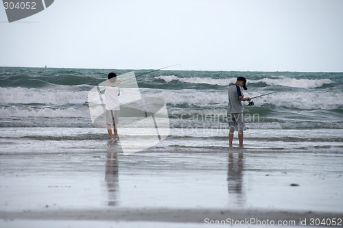 Image of two boys fishing