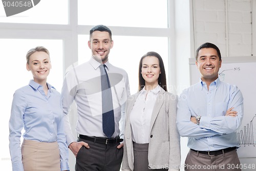 Image of happy business team in office