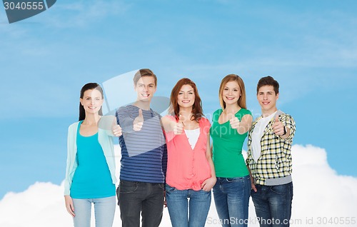 Image of group of smiling students showing thumbs up