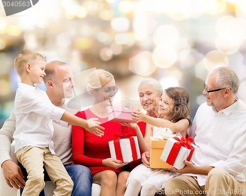 Image of smiling family with gifts