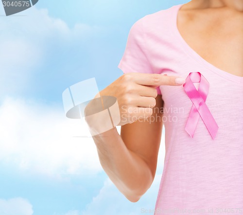 Image of close up of woman with cancer awareness ribbon