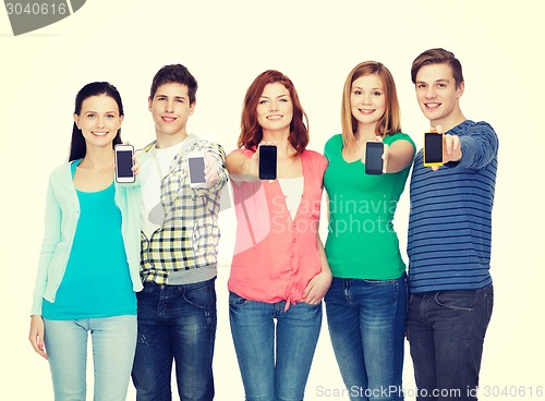 Image of students showing blank smartphones screens